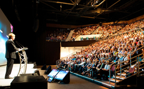 A photo of a full auditorium at the Principals' Conference.